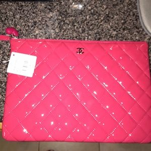 Chanel quilted patent leather clutch